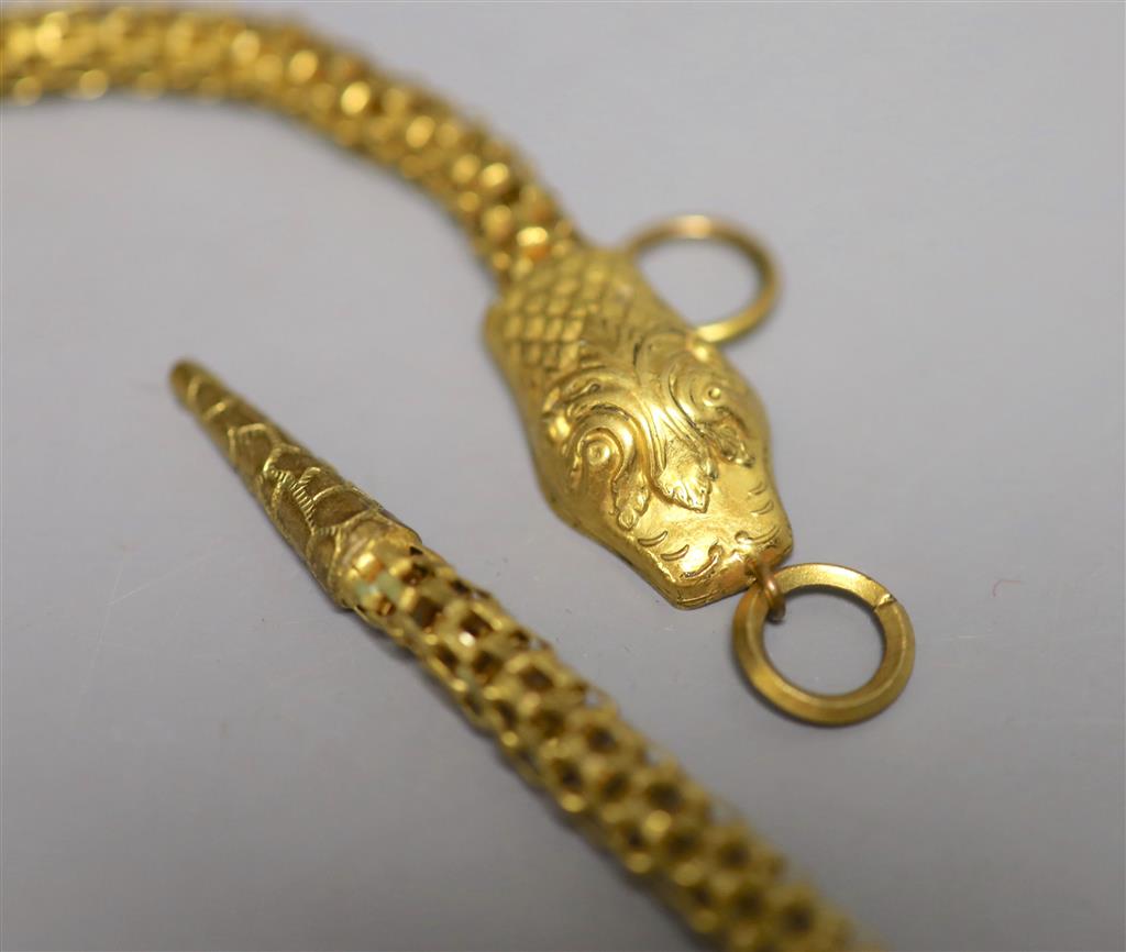 Four items of Victorian pinchbeck jewellery including a serpent necklace, 92cm and three assorted bracelets.